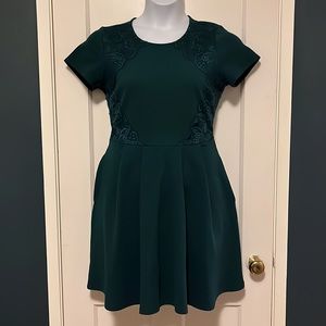 Francesca’s jewel-toned dress with lace details